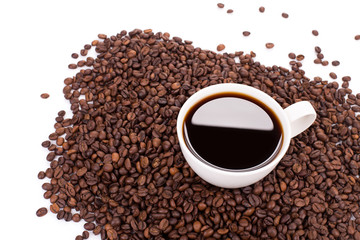 Beans and cup of coffee.