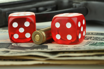 dice, gun and money