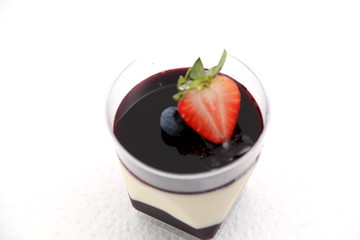 Dessert food blueberry  panacota and wild berry trifle.