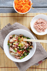 Chinese noodles with tuna in a bowl