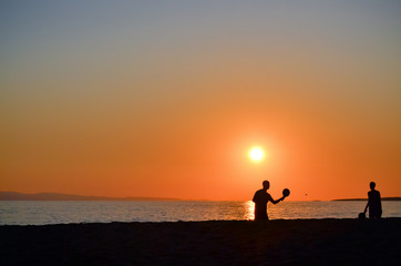 Fototapeta na wymiar Couple at sunset