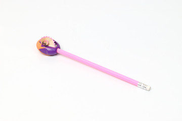 Pencil with sharpener on a white background.