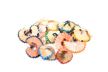 Colour pencils with sharpening shavings isolated on white