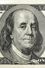 Benjamin Franklin. Hundred dollar bill close-up fragment