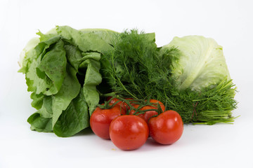 vegetables tomatoes lettuce dill isolated on white background