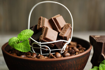 Still life with set of chocolate and coffee grains, closeup