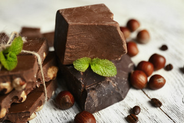 Set of chocolate on wooden table, closeup