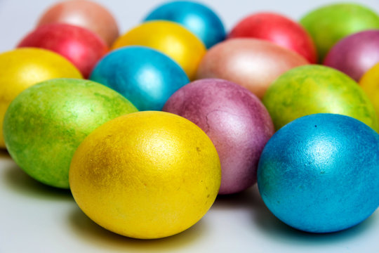 Easter colored eggs  on white bacground