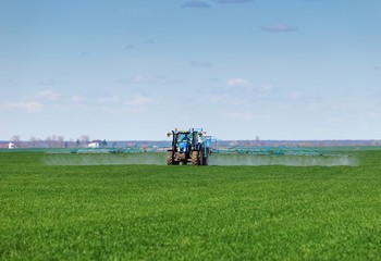 tractor spraying pesticides