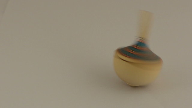 Spinning whirligig, spinner toy tool on white background