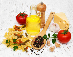 olive oil,  fusilli pasta, garlic and tomatoes