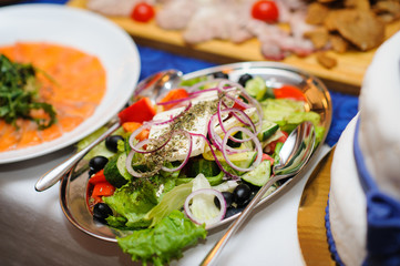 table set service with silverware and glass stemware at restaurant before party