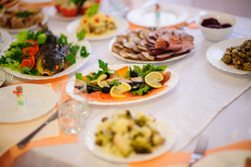 table set service with silverware and glass stemware at restaurant before party