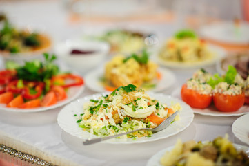 table set service with silverware and glass stemware at restaurant before party