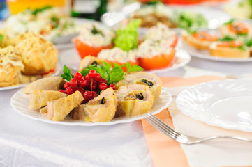 table set service with silverware and glass stemware at restaurant before party