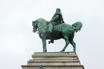 Fototapeta na wymiar Top part of statue Garibaldi on horse in Milan