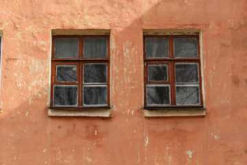 Windows on the wall of an old house