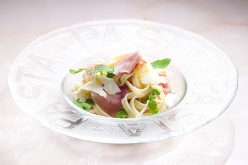 tagliatelle with ruccolla and prosciutto
