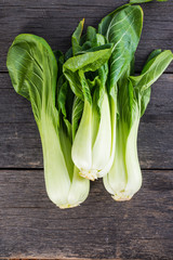 Pak Choi fresh on wooden table