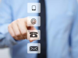 businessman pressing email button, company support icons
