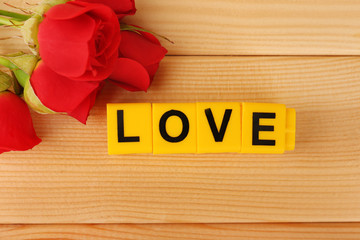 Decorative letters forming word LOVE with flowers