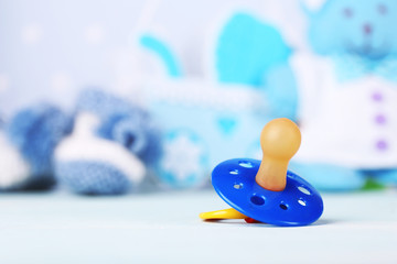 Dummy for baby, close-up, on bright background