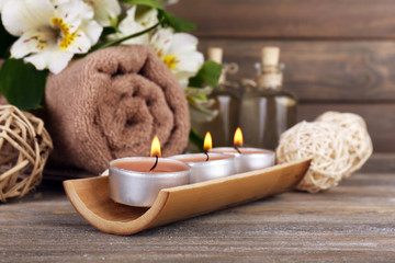 Beautiful spa composition with candles and flowers