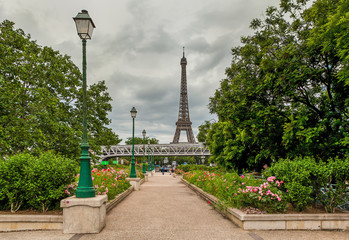 Fototapeta premium Urban park and Eiffel Tower in Paris, France.