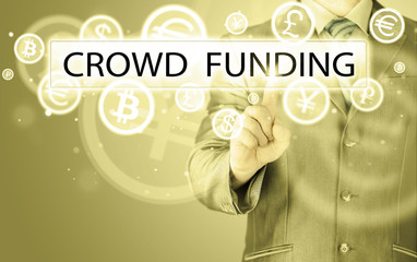Businessman pushes virtual crowd funding button
