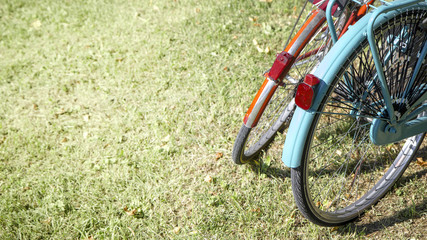 Fototapeta na wymiar Two bikes on the grass