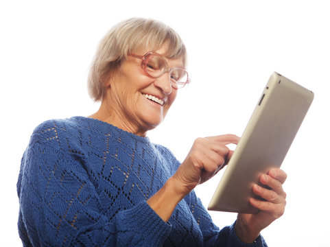 Senior Happy Woman Using Ipad