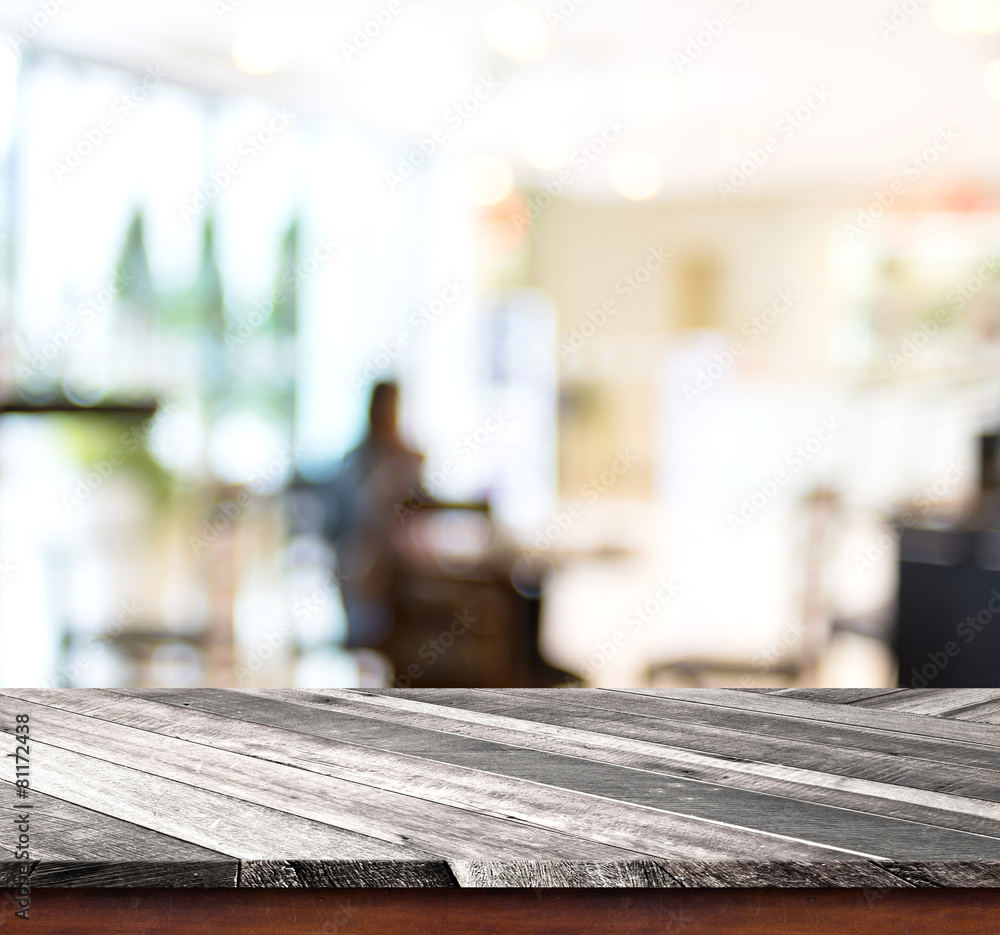 Aufkleber empty wood table top with coffee shop blur with bokeh background