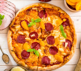 exotic pizza with pineapple and peach