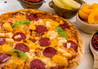 exotic pizza with pineapple and peach