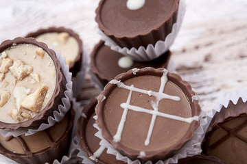 Dark chocolate on wooden background