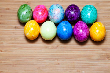 Easter egg, wooden table, colorful