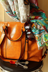 Women's handbags, sunglasses and scarf.