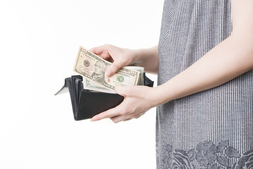 Woman with money in purse in hands