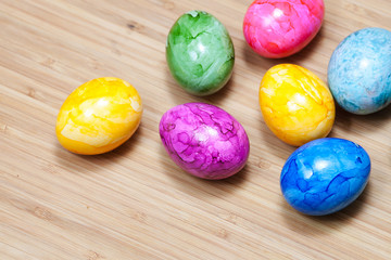 Easter egg, wooden table, colorful