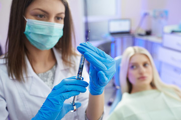 Patient girl in dentist