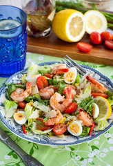 Fresh shrimps, eggs and vegetables salad