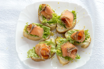 Salmon sandwiches on a plate
