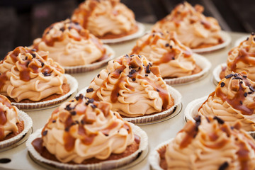 Caramel cupcakes on a baking tray