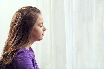 Fototapeta premium Ten year old caucasian girl with long hair posing