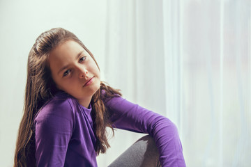 Ten year old caucasian girl with long hair posing