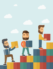 Obraz premium Three men with blocks