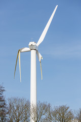 Wind turbine with broken wings after a storm in the Netherlands