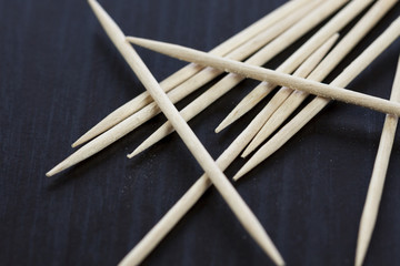 Pile of wooden toothpicks hygiene concept
