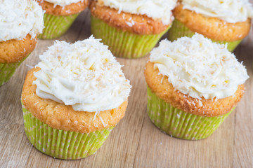 delicious homemade muffins over wooden board