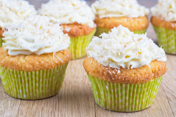 delicious homemade muffins over wooden board